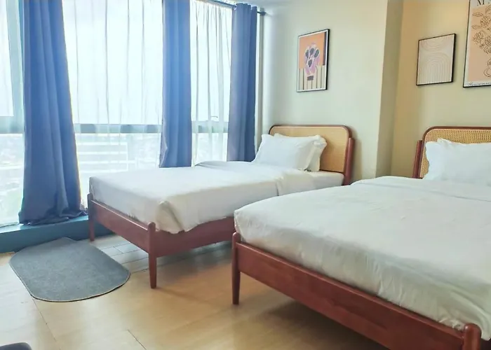 1 Queen Bed & 2 Double Beds At One Uptown Residences With Xbox And Netflix Apartamento Manila